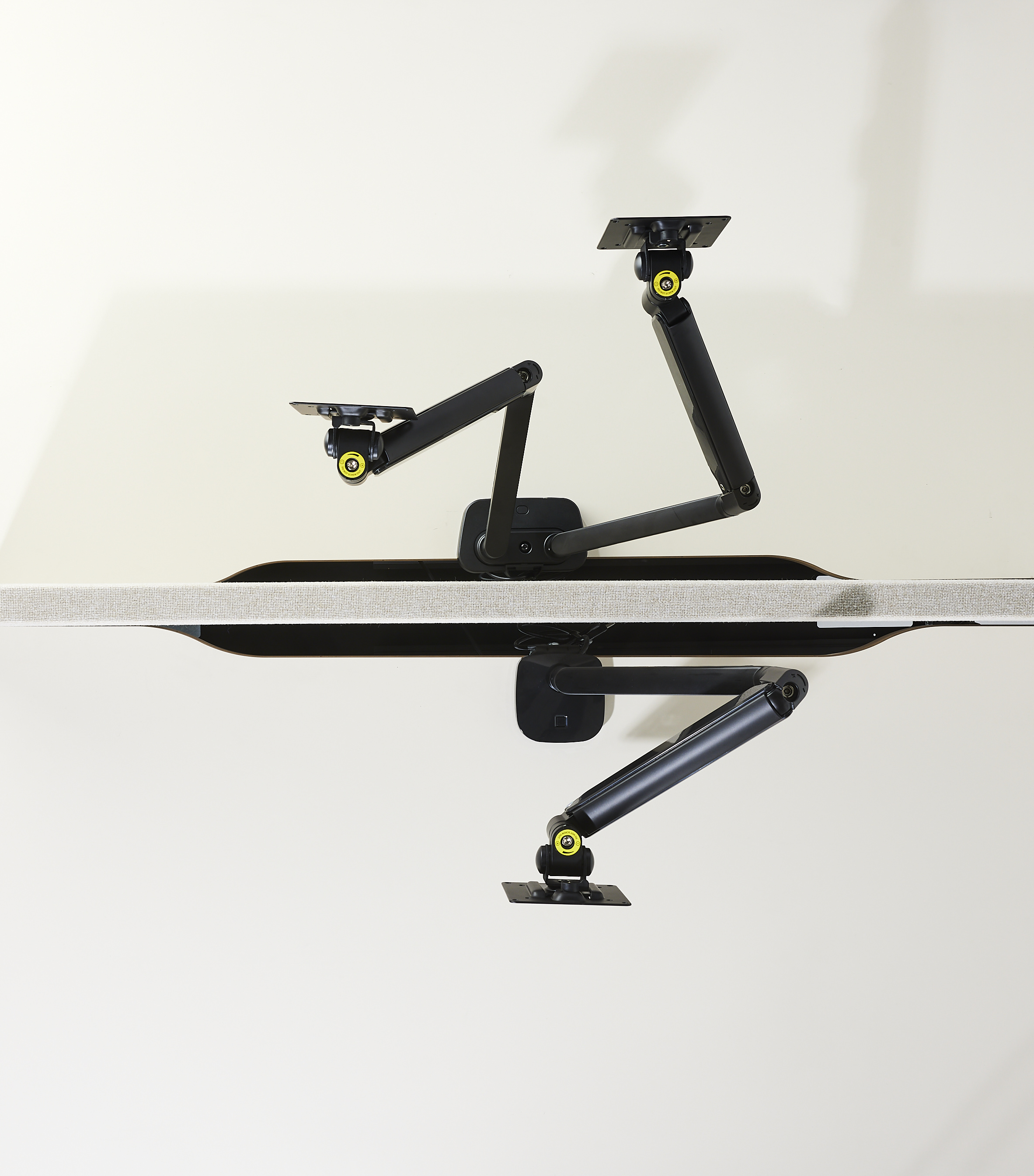 above view of dual monitor arm and single monitor arm in black